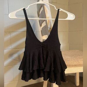 Urban Outfitters, Black crop top with ruffles on the bottom.